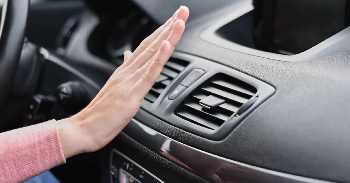 why is my car ac blowing warm air